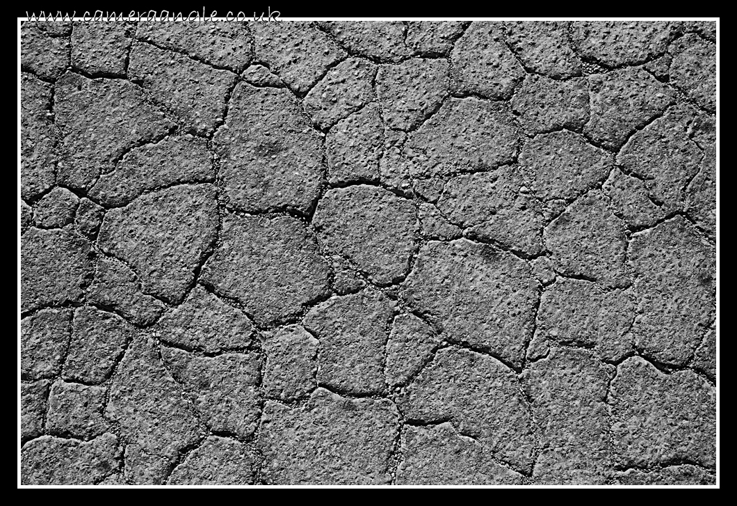 Cracking
A road in to Death Valley cracks in the heat.
Keywords: Death Valley road crack