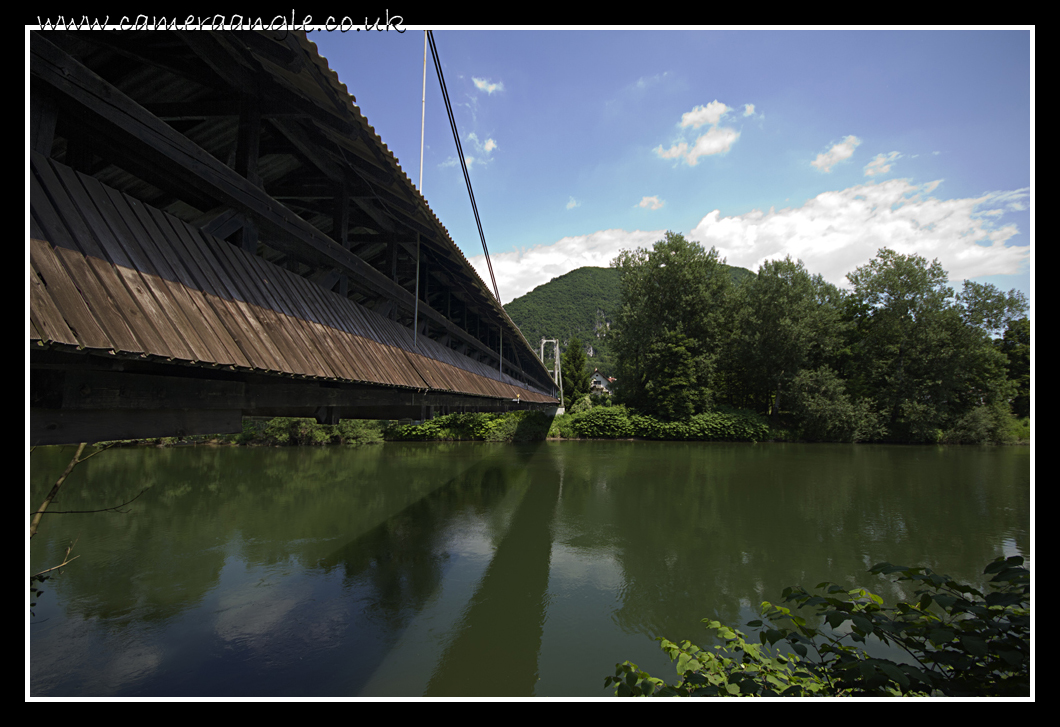 Bridge over the river....
...Sava. A wooden (suspension?) bridge spans the river Sava at Medno, Slovenia.
Keywords: Sava Medno river slovenia