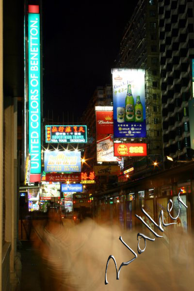 Busy Hong Kong Street
People hurry along a busy, neon lit, Hong Kong street
