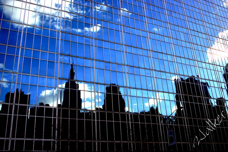 New York Reflection
The skyline of New York reflecting in a glass building.
Keywords: New York Skyline Reflection