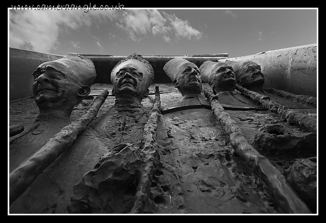 Headroom
Cast heads perch on a church door. Ljubljana, Slovenia
Keywords: Ljubljana, Slovenia door heads