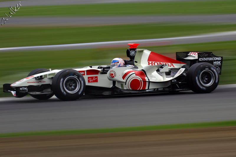 BAR Honda F1 Car
Okay, this is Davidson in his BAR that has been edited. I cut out the car, blurred the background, pasted the car back on and blurred the wheel hubs.

Thats it! 
Keywords: BAR Honda F1 Silverstone