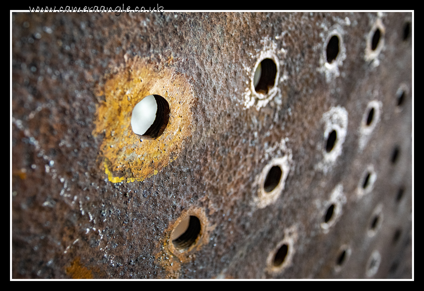 Rusty Holes
Keywords: Rusty Holes